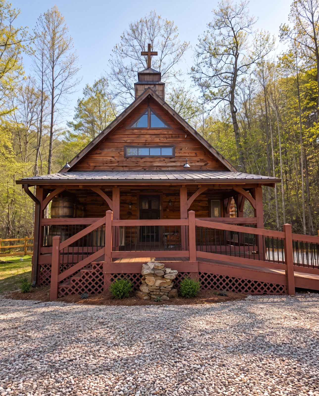 The Chapel at Trembly Bald, a log building with a cross on its gable and a wraparound porch